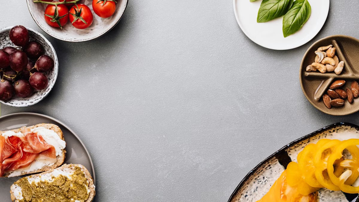 Fresh ingredients with sandwiches in a flat lay style, offering a gourmet meal concept.